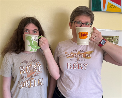 mother and daughter wearing gilmore girls tshirts
