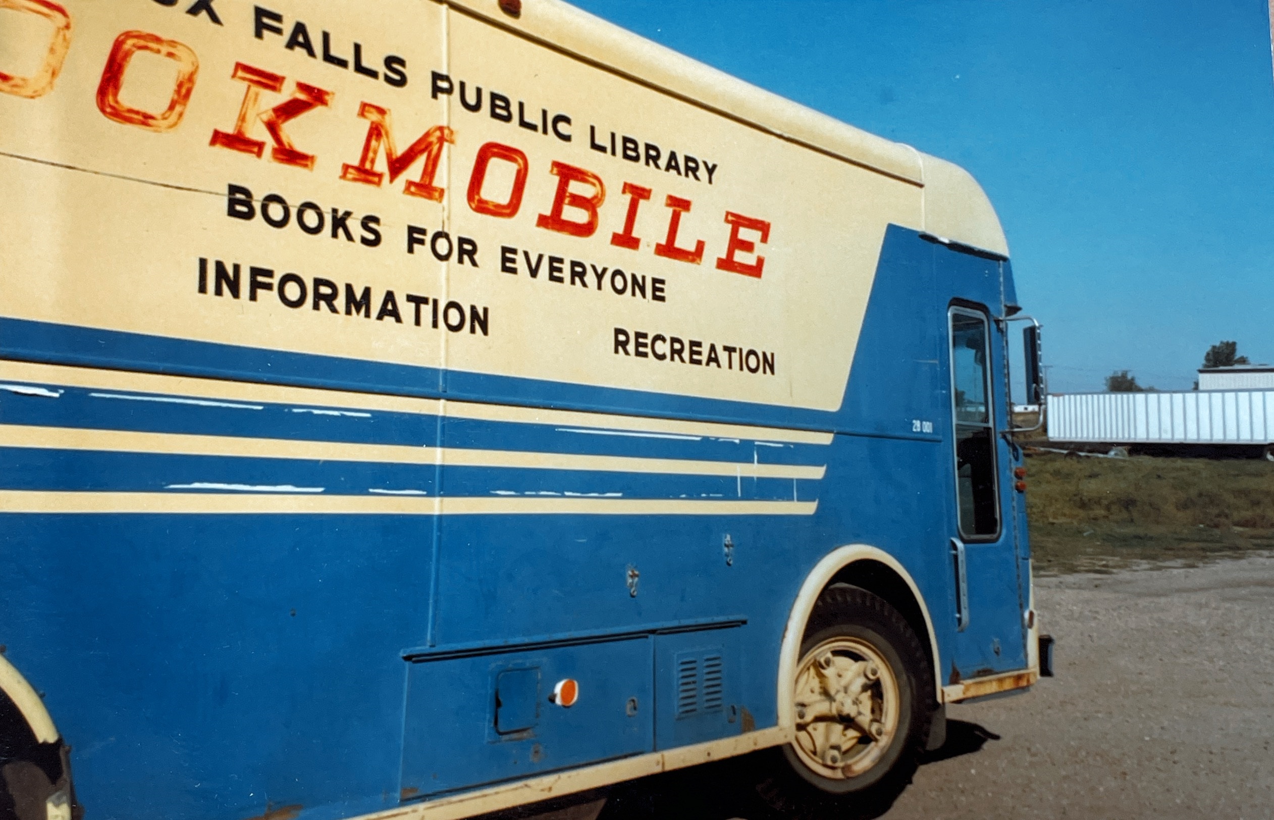 Bus-like vehicle says on the side, Sioux Falls Public Library Bookmobile, Books For Everyone.