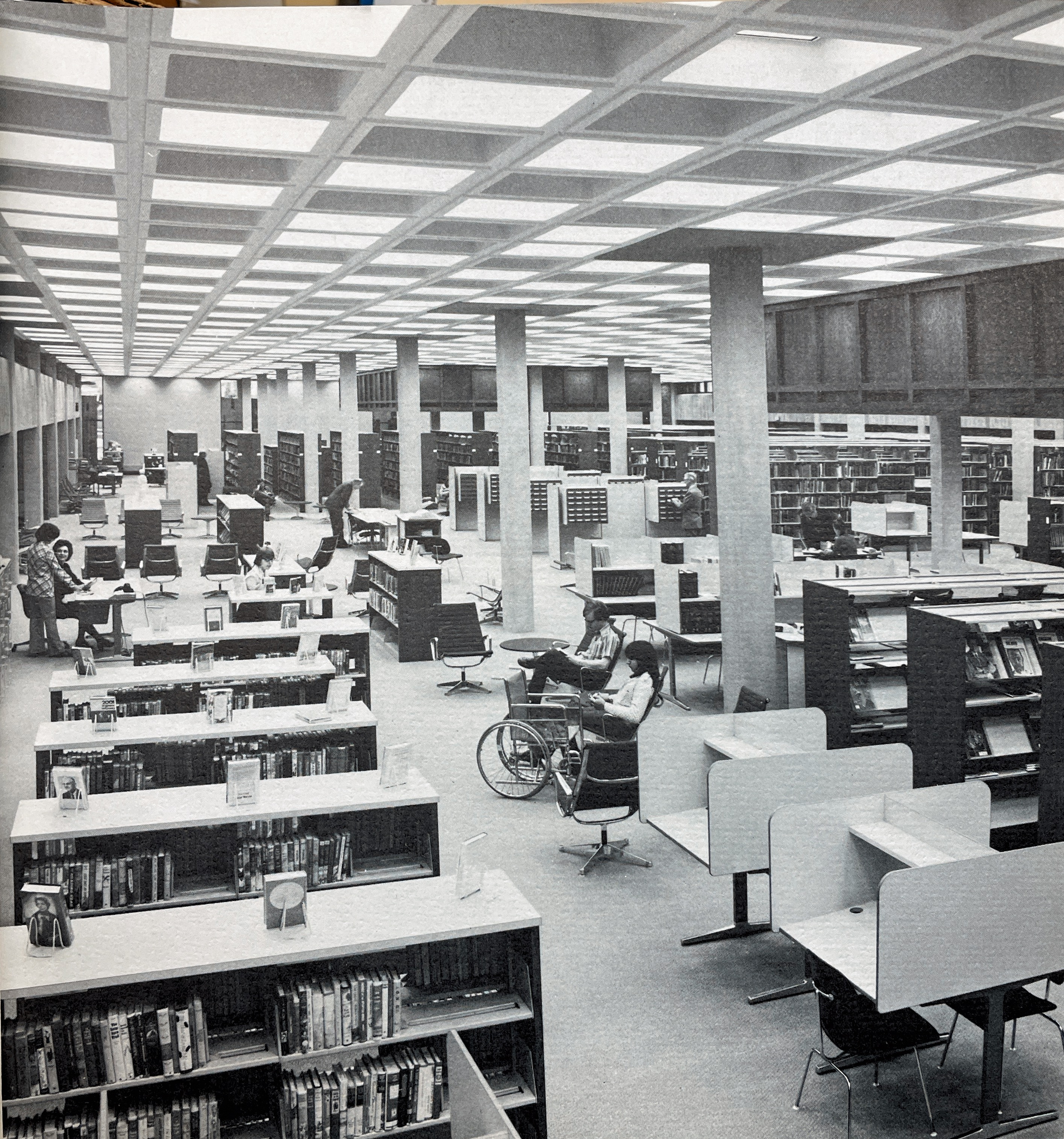 Interior of the newly-constructed Main Library downtown, with bookshelves and study carrels